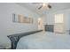 Bright bedroom offers ample space, natural light, and neutral decor to allow for personalization at 12048 E Chevelon Trl, Gold Canyon, AZ 85118