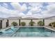 Beautiful pool with clear water and relaxing in-pool lounge chairs at 12048 E Chevelon Trl, Gold Canyon, AZ 85118