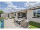 Backyard features a sparkling pool, fire pit, lounge chairs, and patio area at 12048 E Chevelon Trl, Gold Canyon, AZ 85118