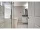 Bathroom featuring a shower and tub, and a granite countertop at 12543 W Roanoke Ave, Avondale, AZ 85392