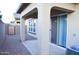 Covered back patio, perfect for entertaining, complemented by a gravel side yard at 1255 N Arizona Ave # 1216, Chandler, AZ 85225
