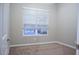 Cozy bedroom featuring neutral walls, plush carpeting, and a bright window with blinds for natural light at 1255 N Arizona Ave # 1216, Chandler, AZ 85225