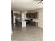 Spacious kitchen features stainless steel appliances, an island, ample cabinet space, and recessed lighting at 1255 N Arizona Ave # 1216, Chandler, AZ 85225