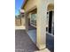 Covered patio with concrete flooring and stucco pillars, providing a comfortable outdoor living space at 1255 N Arizona Ave # 1216, Chandler, AZ 85225