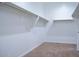 Spacious walk-in closet with ample shelving for optimal organization and storage solutions at 1255 N Arizona Ave # 1216, Chandler, AZ 85225