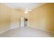 Spacious bedroom with neutral tile flooring and a ceiling fan at 135 S Verde Ln, Casa Grande, AZ 85194