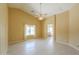 Vaulted bedroom features a large window and neutral tile flooring at 135 S Verde Ln, Casa Grande, AZ 85194
