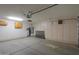 Garage with built-in cabinets and ample storage space at 135 S Verde Ln, Casa Grande, AZ 85194