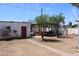 Expansive backyard features mature trees and a versatile open space at 1367 E Clarendon Ave, Phoenix, AZ 85014