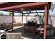 Outdoor patio area featuring a covered patio with a pizza oven at 1367 E Clarendon Ave, Phoenix, AZ 85014