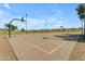 Public basketball court for recreational play, featuring multiple hoops and ample space at 1511 E Harmony Ave, Mesa, AZ 85204