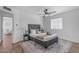 Comfortable bedroom featuring a cozy bed, stylish rug, and ample natural light at 1511 E Harmony Ave, Mesa, AZ 85204