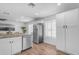 Well-lit kitchen features granite countertops, stainless steel appliances, and ample cabinet space at 1511 E Harmony Ave, Mesa, AZ 85204