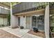 Charming condo featuring a gated front door, large windows, and an upstairs balcony at 1828 W Tuckey Ln # 13, Phoenix, AZ 85015