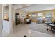 Bright dining room with lovely furniture and view of front yard at 20394 N Coronado Way, Surprise, AZ 85374