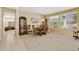 Open dining area with a classic dining set, natural light, and stylish decor at 20394 N Coronado Way, Surprise, AZ 85374