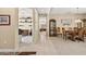 Inviting dining room with neutral colors, decorative hutch, and an open floor plan at 20394 N Coronado Way, Surprise, AZ 85374