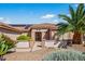 Charming one-story home with a tile roof, desert landscaping, and an inviting entrance in a sunny neighborhood at 20394 N Coronado Way, Surprise, AZ 85374