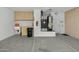 Garage with utilities, lots of storage cabinets, sink and epoxy flooring at 20394 N Coronado Way, Surprise, AZ 85374