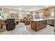 Spacious living room and kitchen area with modern appliances and fixtures at 20394 N Coronado Way, Surprise, AZ 85374