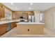 Well-appointed kitchen with stainless steel appliances, a center island, and modern countertops at 20394 N Coronado Way, Surprise, AZ 85374