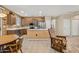 Modern kitchen with stainless steel appliances, a center island, and plenty of cabinet space at 20394 N Coronado Way, Surprise, AZ 85374
