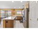 Gorgeous kitchen with stainless steel appliances and a central island at 20394 N Coronado Way, Surprise, AZ 85374