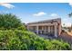 Covered patio is an entertainer's dream, providing shade and comfortable lounge seating for enjoying outdoor living at 20394 N Coronado Way, Surprise, AZ 85374