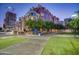 Multi-story building exterior featuring lush green spaces, convenient walkways, and nearby amenities for an active lifestyle at 21 E 6Th St # 316, Tempe, AZ 85281