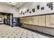 Upscale building lobby with modern mailbox area, tile flooring, sleek design, and convenient elevator access at 21 E 6Th St # 316, Tempe, AZ 85281