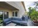 Stylish backyard featuring a grill, tiled patio, and comfortable seating area at 2142 E Turney Ave # 9, Phoenix, AZ 85016