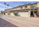 Charming townhouse with a two-car garage and well-maintained brick driveway at 2142 E Turney Ave # 9, Phoenix, AZ 85016