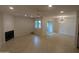 Spacious living room features fireplace, recessed lighting, ceiling fan and sliding door at 2142 E Turney Ave # 9, Phoenix, AZ 85016