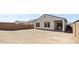 View of the empty backyard at 23404 W Burton Ave, Buckeye, AZ 85326