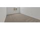 This is a cozy bedroom with neutral carpet, natural light and minimalist style, great for rest and relaxation at 23404 W Burton Ave, Buckeye, AZ 85326
