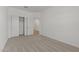 Spacious bedroom with ample closet space and neutral decor, providing a blank canvas for personalization at 23404 W Burton Ave, Buckeye, AZ 85326