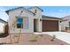 Charming home featuring a low-maintenance landscape and a two-car garage at 23404 W Burton Ave, Buckeye, AZ 85326