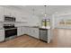 Modern kitchen featuring stainless steel appliances and ample countertop space at 23404 W Burton Ave, Buckeye, AZ 85326