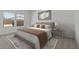 Comfortable primary bedroom featuring soft lighting, a plush bed, and stylish decor for a relaxing retreat at 23404 W Burton Ave, Buckeye, AZ 85326