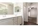 Bathroom featuring double sinks and a view of the walk-in shower at 2554 E Vermont Dr, Gilbert, AZ 85295