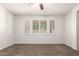 Bedroom featuring ample natural light and a ceiling fan for added comfort at 2554 E Vermont Dr, Gilbert, AZ 85295