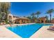 Community pool offers a gazebo with lounge chairs and shade, all set against a clear blue sky at 2554 E Vermont Dr, Gilbert, AZ 85295