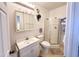 Bright bathroom features a vanity, shower stall, and ample lighting at 272 S Cinnabar Dr, Apache Junction, AZ 85119