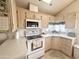 Clean and functional kitchen featuring ample counter space and modern appliances at 272 S Cinnabar Dr, Apache Junction, AZ 85119