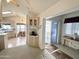Bright and open living area with an adjacent view of the kitchen and outdoor space at 272 S Cinnabar Dr, Apache Junction, AZ 85119