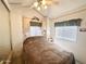 Comfortable bedroom featuring a spacious bed, built-in cabinets, and soft lighting at 272 S Cinnabar Dr, Apache Junction, AZ 85119