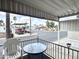 Inviting covered porch with patio furniture, ideal for relaxing and enjoying outdoor views at 272 S Cinnabar Dr, Apache Junction, AZ 85119