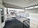 Relaxing, covered porch provides an inviting outdoor seating area with views of the park at 272 S Cinnabar Dr, Apache Junction, AZ 85119