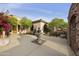 Charming courtyard features a decorative fountain, mature landscaping, and seating area, offering a peaceful retreat at 2727 S Balboa Dr, Gilbert, AZ 85295