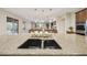 Close-up of the large kitchen island featuring granite countertops and a stainless steel sink at 2727 S Balboa Dr, Gilbert, AZ 85295